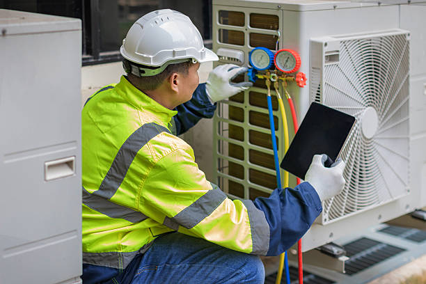 Professional Hvac technician working in Great River, NY